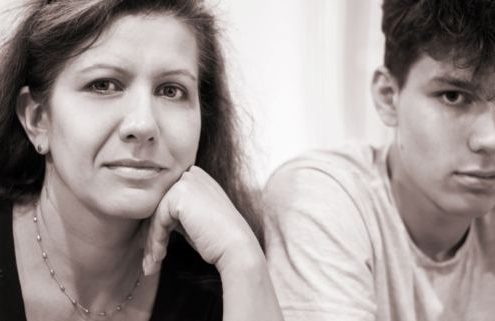 Both the teenage son and mother are looking defeated as they struggled to communicate properly.